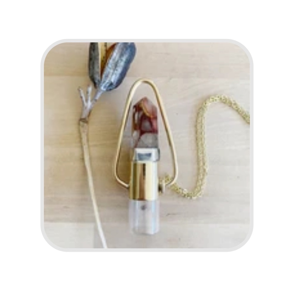 Rising Sun Apotheca oil rollerball necklace